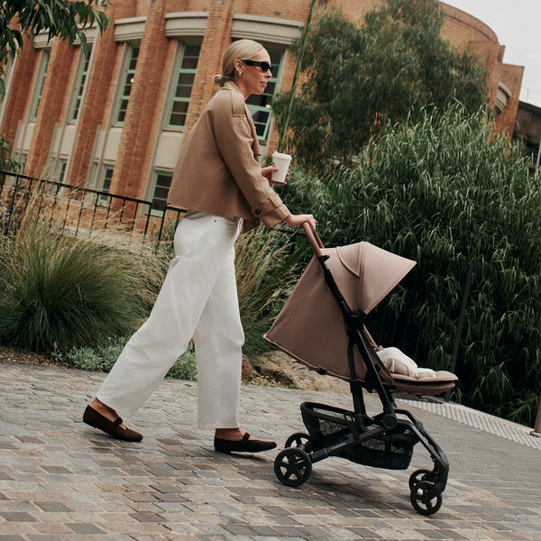 MILES2 pushing pram